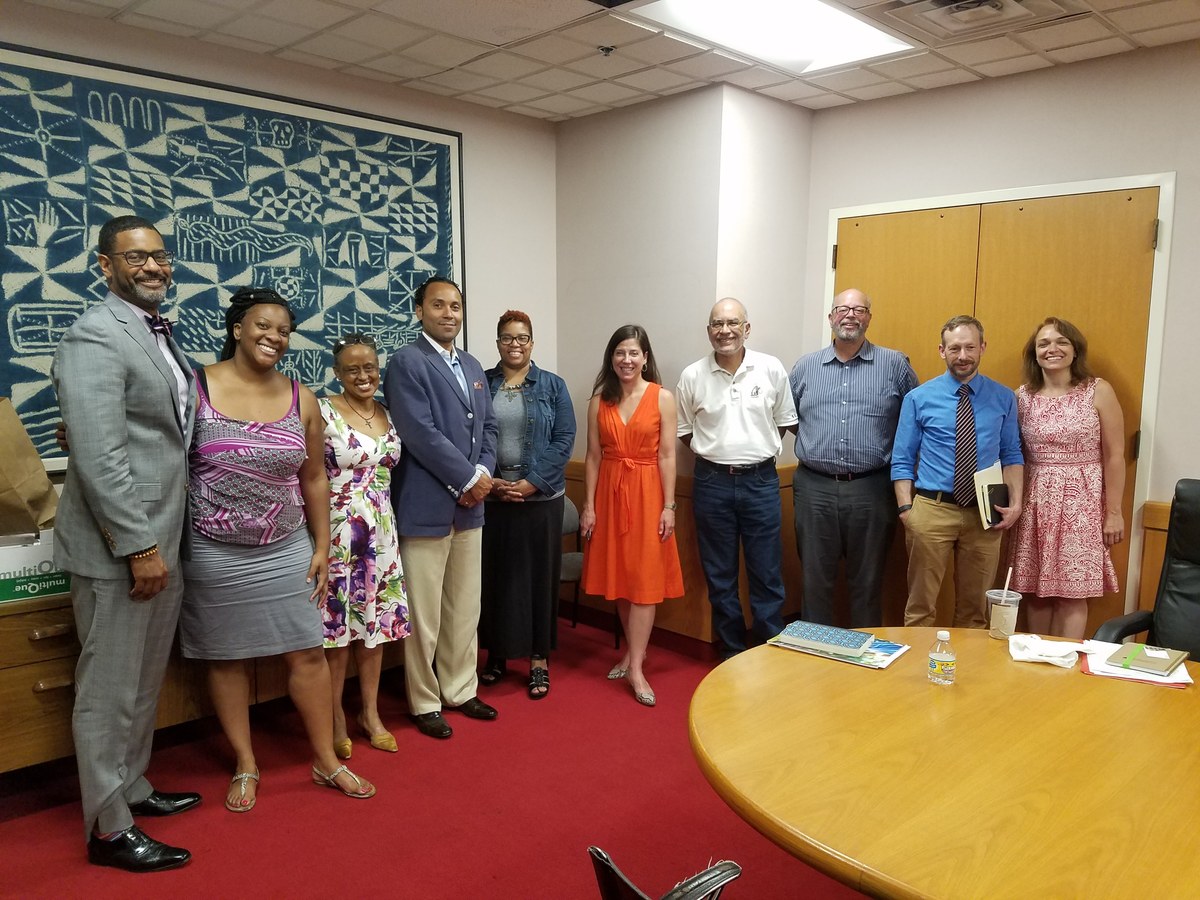 Gigi with the Imani Village team at Trinity UCC