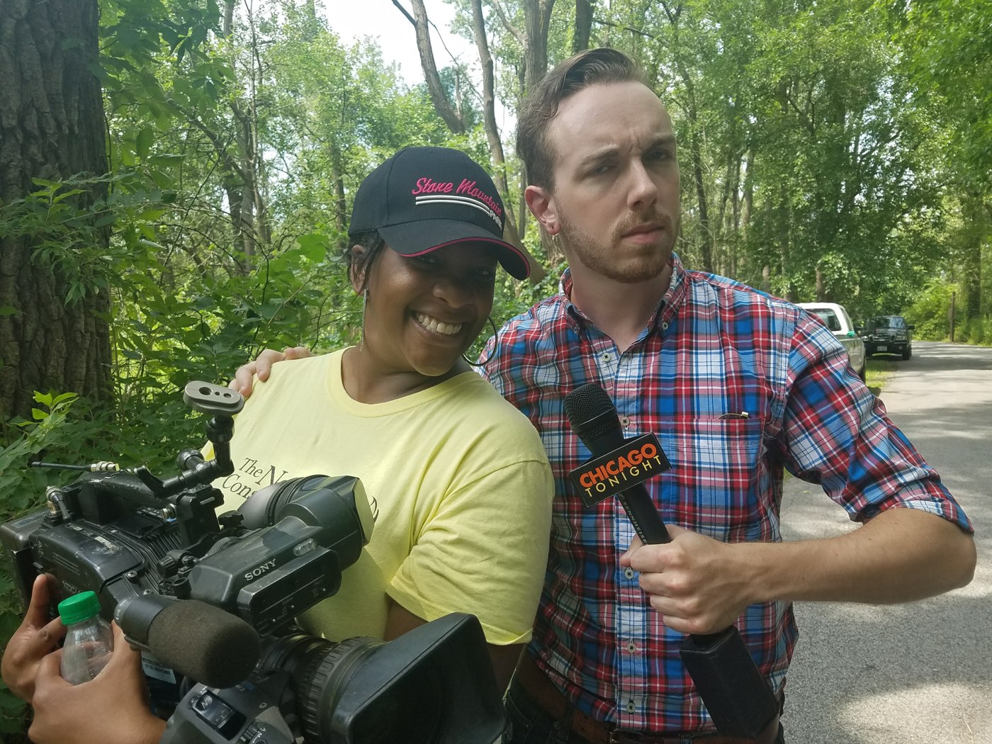 Gigi on location with Nick Blumberg, producer for WTTW's Chicago Tonight, during a Nature Conservancy media day